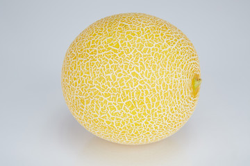 Yellow melon isolated on the white background.