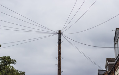 Telegraph pole with many cables