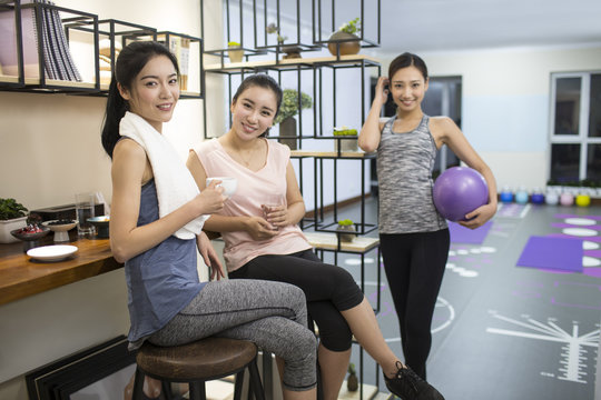 Best female friends resting at gym