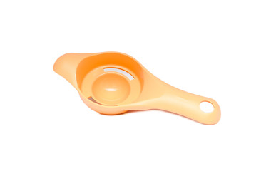 Modern plastic spoon egg separator isolated