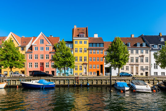 Colourful houses along canal in Downtown District of Copenhagen Denmark