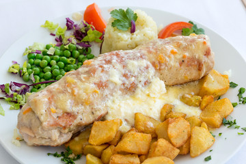 Stuffed rolled meat with vegetables