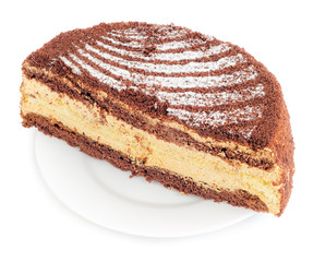 Cake cut in half in plate isolated