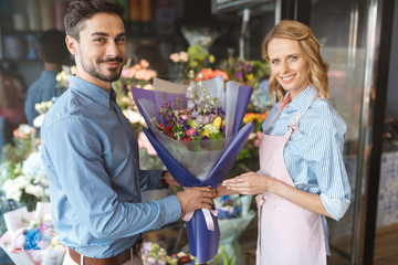 florist and buyer with bouquet
