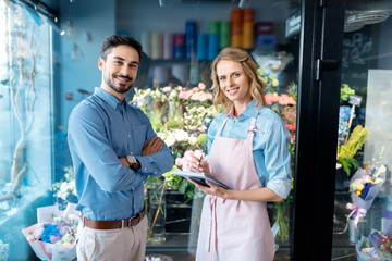 florist and buyer in flower shop