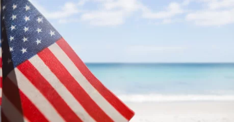 Cercles muraux Plage et mer USA flag in the beach