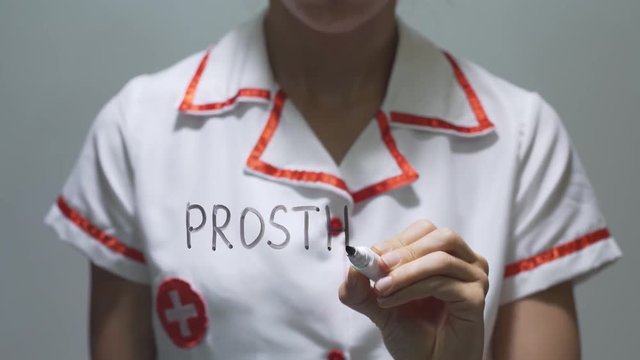 PROSTHESIS, Female doctor writing on transparent screen