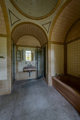 Vintage Brown and Yellow Tiled Bathroom with Fixtures - Abandoned Mansion