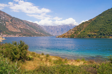Naklejka premium View of the Bay of Kotor - the winding gulf of the Adriatic Sea - on a summer day. Montenegro