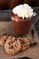 hot chocolate with cocoa and chocolate chip cookies.