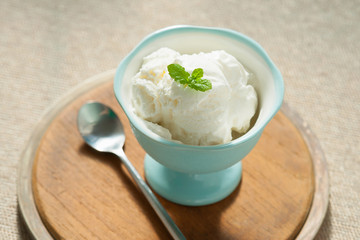 Ice cream in bowl and spoon 