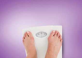Weighing scales feet with purple background