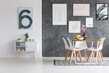 Spacious dining room with posters