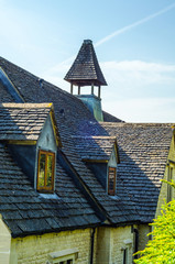 Roofs of buildings covered with sar roof tile, beautiful English architecture, old roofs