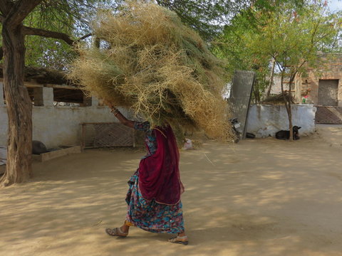 woman carrying a balot