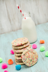 Stack of Colorful Birthday Confetti Cookies with Milk
