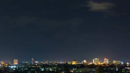 Fototapeta na wymiar landscape city night with dramatic moody dark sky