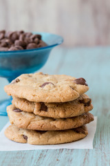 Chocolate Chip Cookies with a Bowl of Chips Close Up