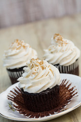 Chocolate Cupcakes With One Peeled Open