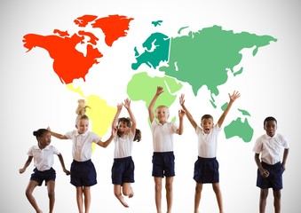 Multicultural Kids jumping in front of colorful world map