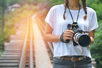 Young woman photographer Travel on public railways (Outdoor)