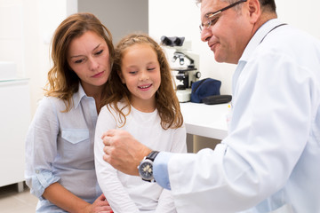Fototapeta premium Doctor and young patient in office