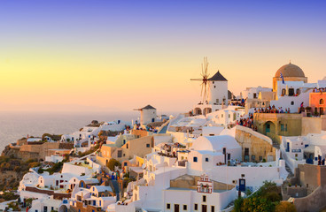 view on Oia village during sunset, Santorini island, Cyclades, Greece - obrazy, fototapety, plakaty