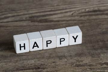 Happy, written in cubes