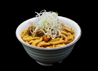 Curry Udon Or Japanese noodle with curry in bowl. Japanese tradition cuisine with black isolated background