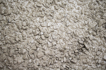 concrete, pebble, sand, water mixed togather at construction site