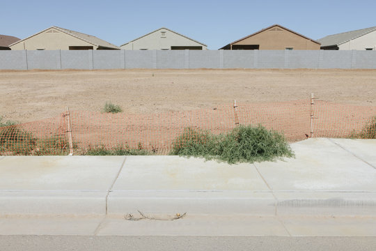 Partially completed suburban housing development on outskirts of Phoenix