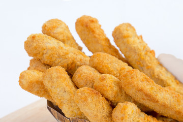 Deep fried chicken nugget stick on white background