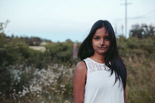Portraits of young south asian girl enjoying being outside