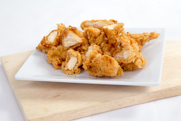 Crispy crisp chicken fillet breaded with corn flake crumbs with sauce