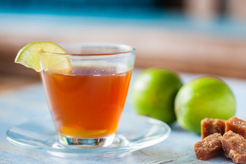 Hot sugarcane-water (aguapanela) with lemon