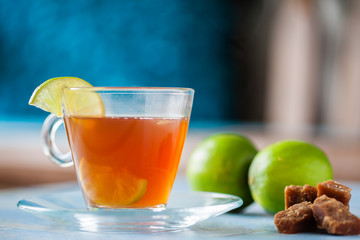 Hot sugarcane-water (aguapanela) with lemon