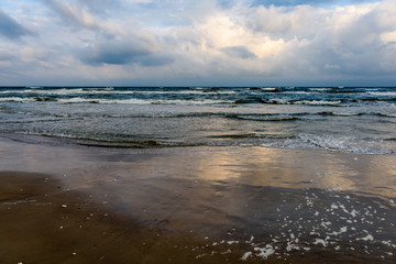 View of a stormy beach in the morning.