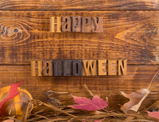 Happy Halloween Sign on a Rustic Wooden Background