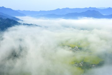 village under the fog
