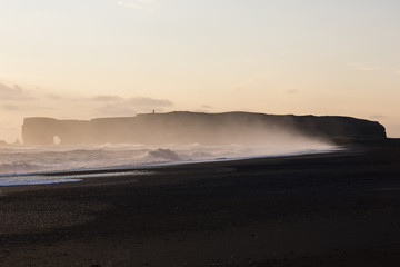 Fototapeta na wymiar Cape Dirholaey in southern Iceland during sunset on a foggy day