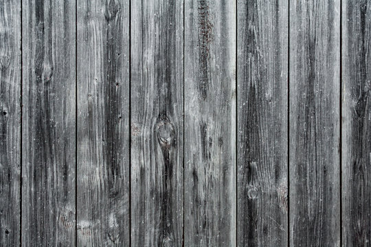 Aged cracked wooden wall panels (texture, background)