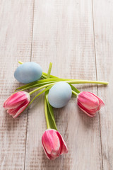 Pink Tulips and blue Easter Eggs From Above