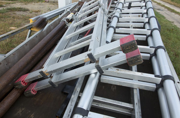 Construction ladders prepared for transport