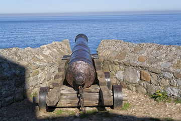 An ancient cannon of fortified defense.