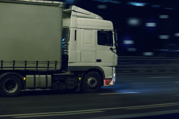 truck moving on night city