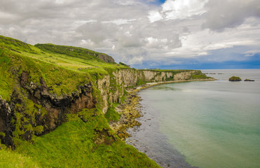 Landscape of Northern Ireland. Cliffs os Carrick-a-rede rope bridge in Ballintoy, Co. Antrim....