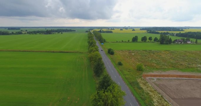 Aerial footage of amazing summer landscape. Fields and meadows from above.