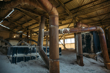 Inside the tower of a large abandoned industrial elevator