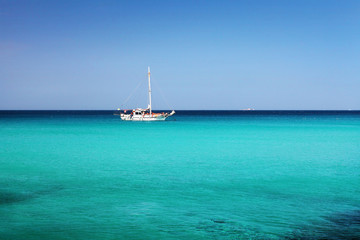 Obraz premium sailboat in the blue water