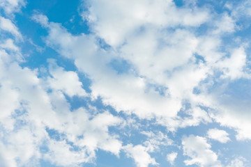 Obraz premium Nature background.Soft cloud in the blue sky on a sunny day.